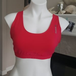 Reebok. Hot pink play Ice sports bra. Medium.